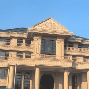 三沙黄金麻别墅外墙干挂石材效果示例