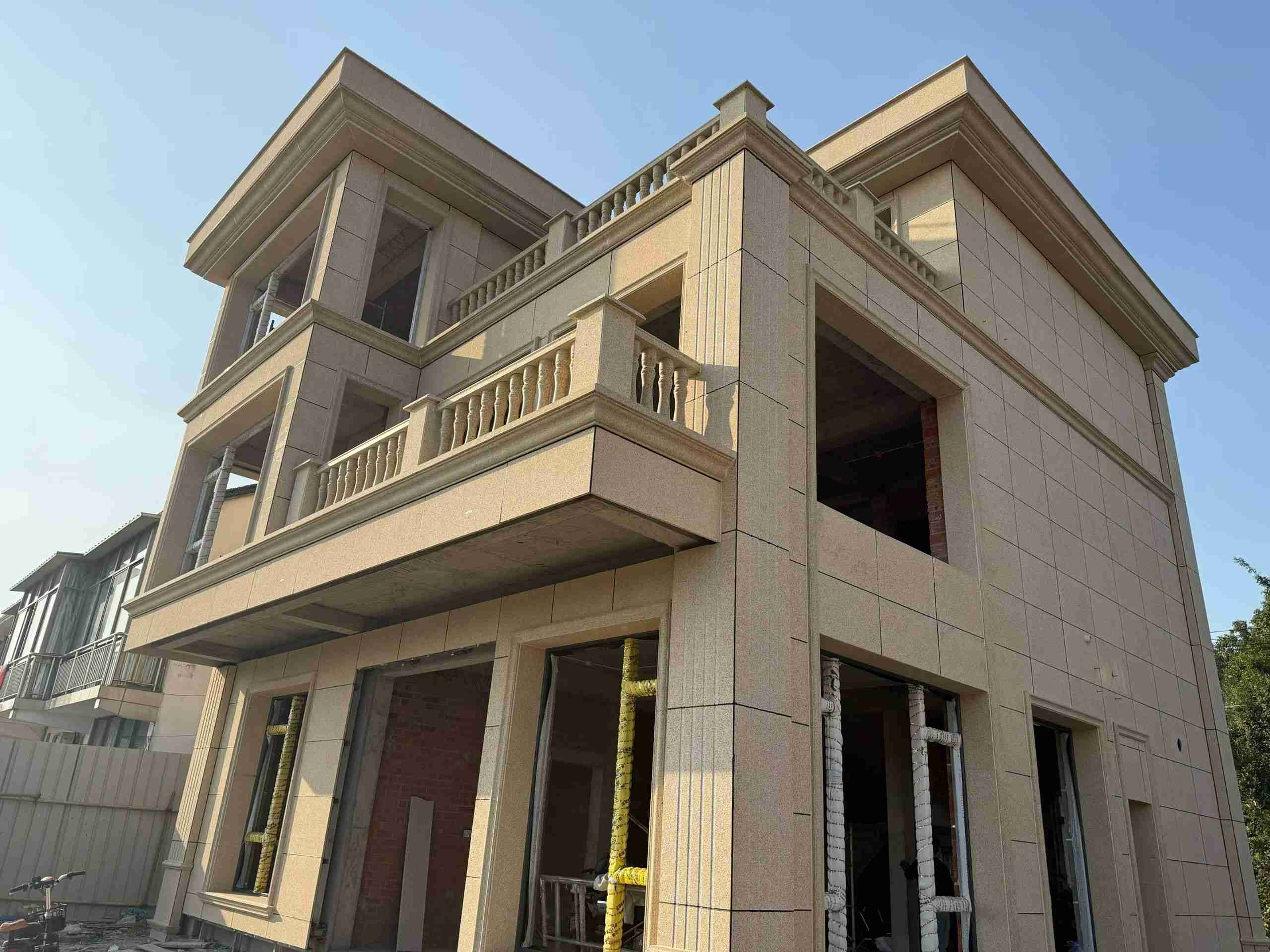 三沙 黄金麻花岗岩石材荔枝面外墙干挂效果展示