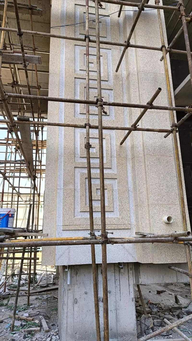 三沙 黄金麻花岗岩别墅外墙干挂回纹造型效果